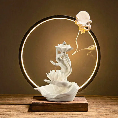 Brûle-encens, cercle de lumière LED, céramique artisanale  raffinée, fleur de lotus dans la main